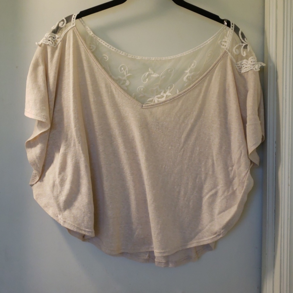 Tan top with white lace on back fits flowy